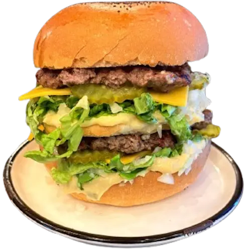 Big Grrreat - Burger avec deux steaks de 100g, cheddar, oignons, salade et sauce Big. Commandez maintenant !