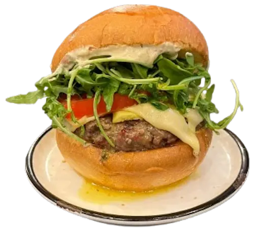 I Love Paris - Un burger avec steak, jambon, emmental, salade, tomates et sauce Paris. Commandez maintenant!