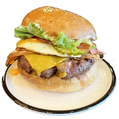 NYC - Burger avec steak, œuf, bacon, cheddar, salade, tomate et sauce burger. Commandez maintenant !